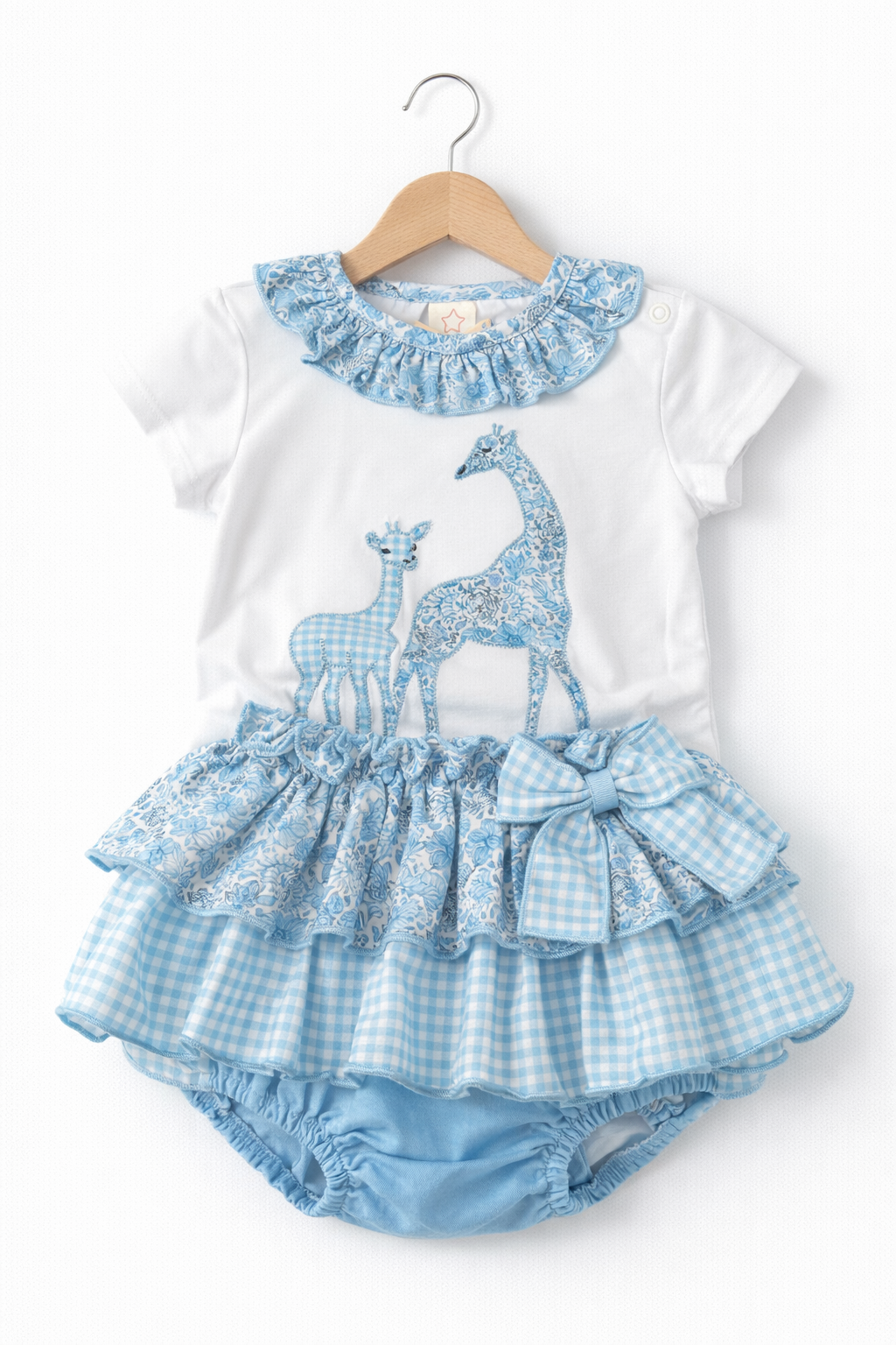 Conjunto jirafa niña